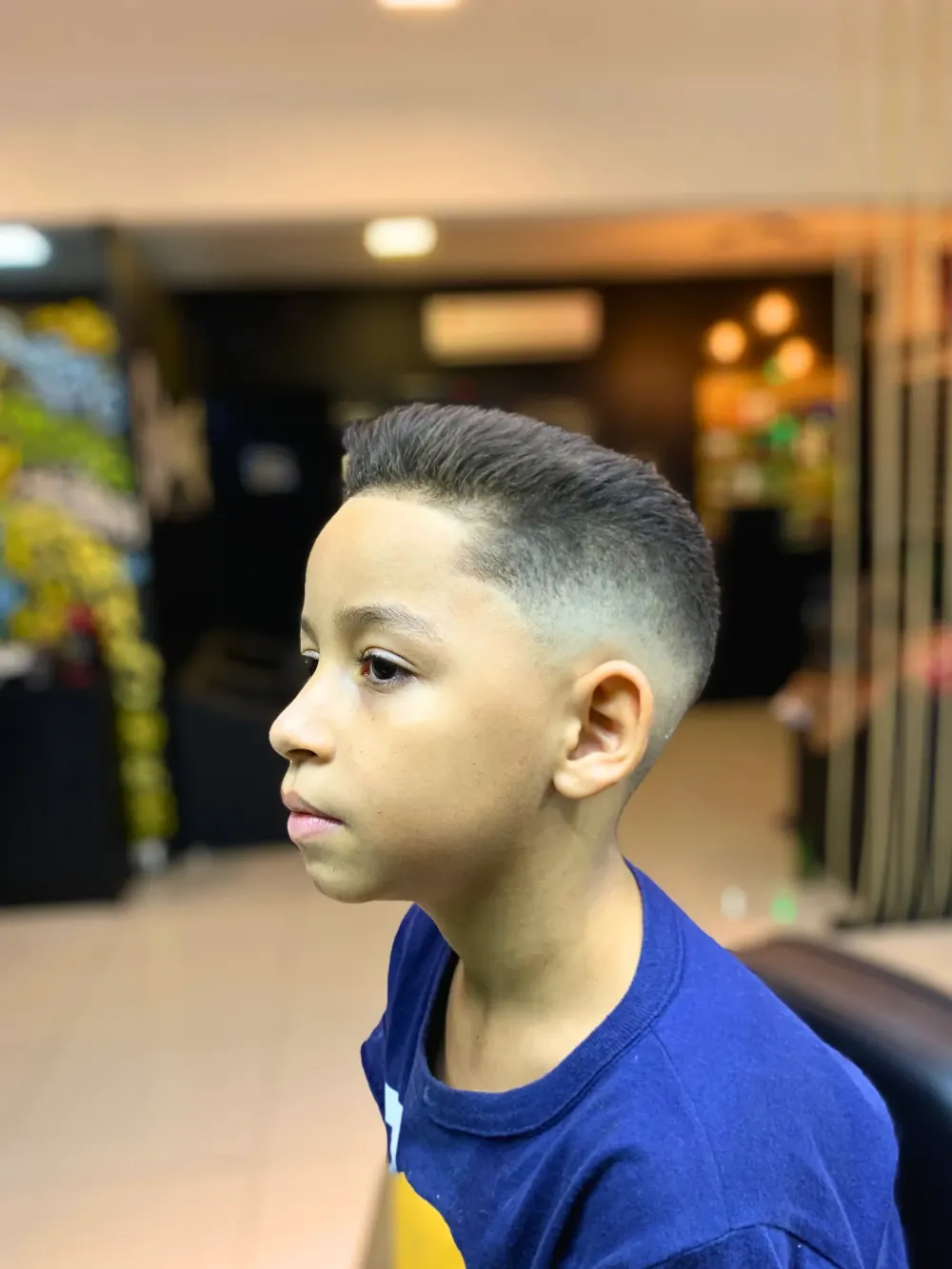 Corte infantil com fade lateral – Garage Studio